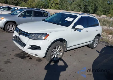 2014 Volkswagen Touareg Tdi Lux z USA, uszkodzony, nr VIN WVGEP9BPXED012958